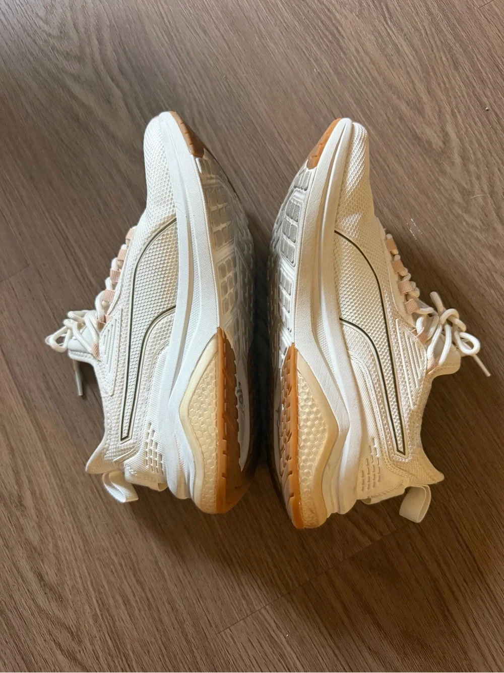 Puma women’s Off-White Cream Athletic Sneakers